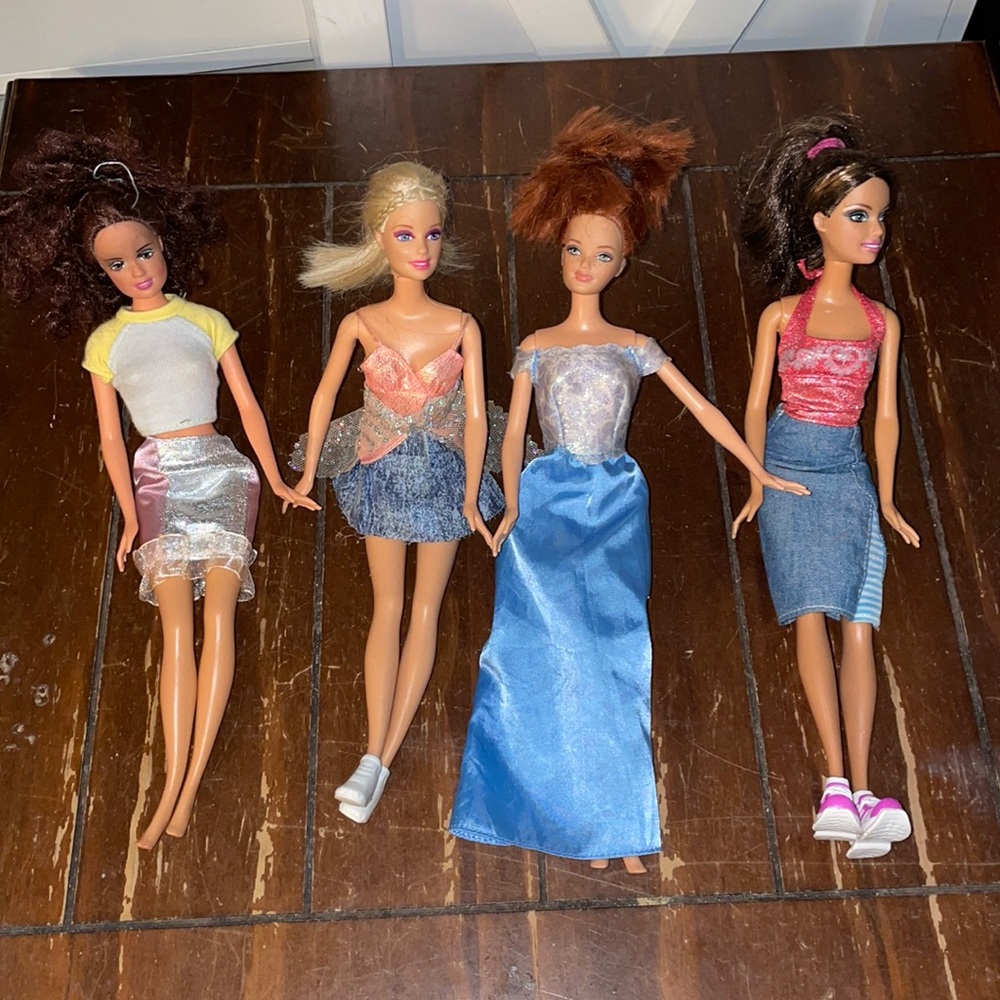 4 Barbie dolls